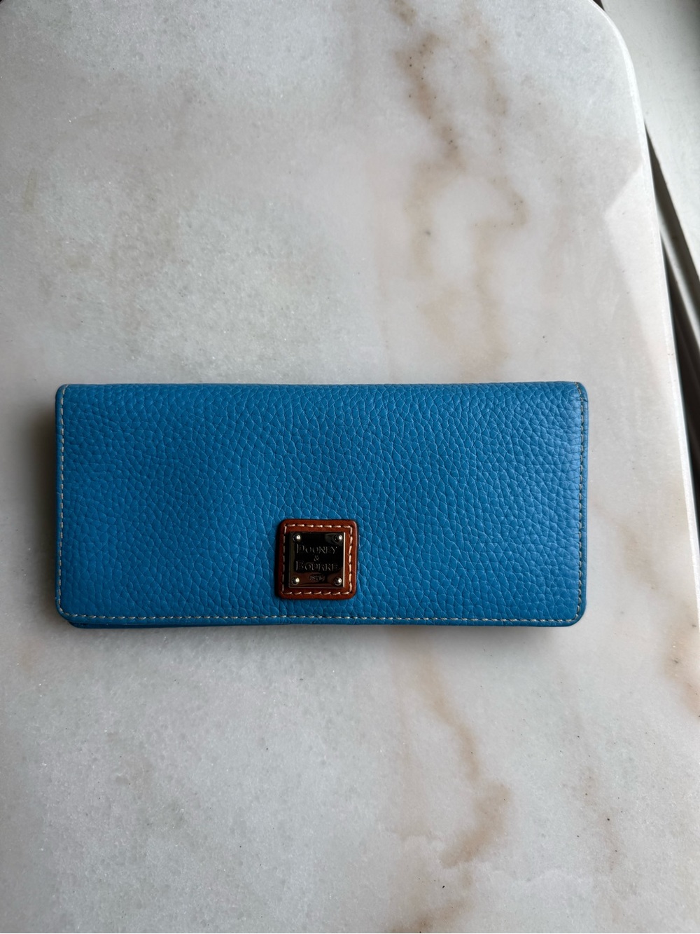 Dooney and Bourke Blue pebbled leather wallet- snap closure